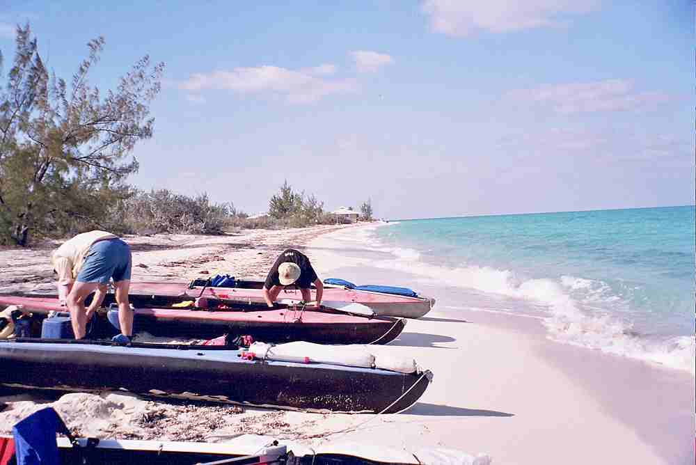 Packing kayaks on beach